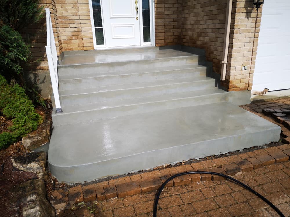 Newly constructed concrete house stairs resurfaced waiting to dry out