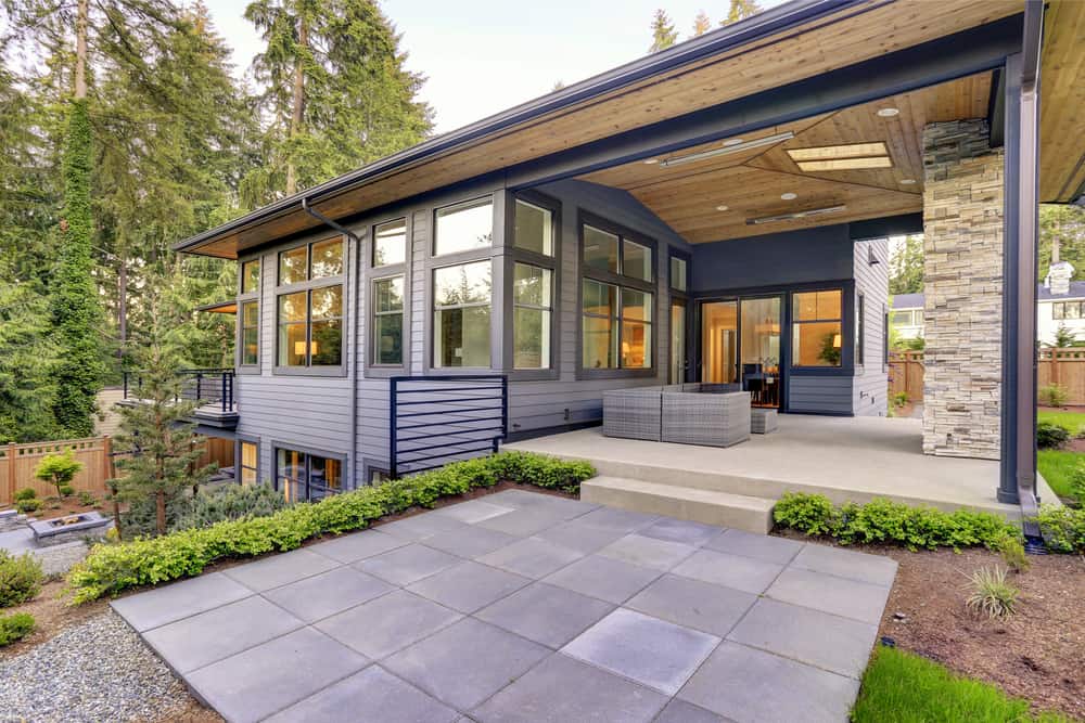 Picture of a completly installed concrete patio in a luxury house courtyard